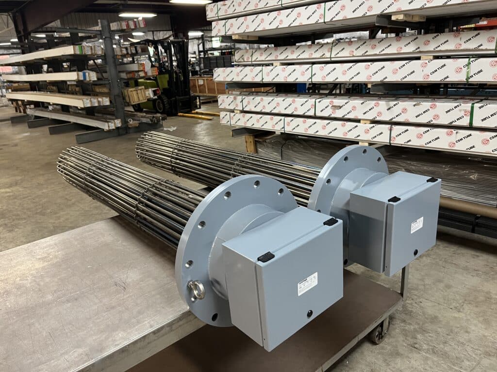 Two Titanium 12" ANSI Flanged Sodium Hypochlorite Heaters.